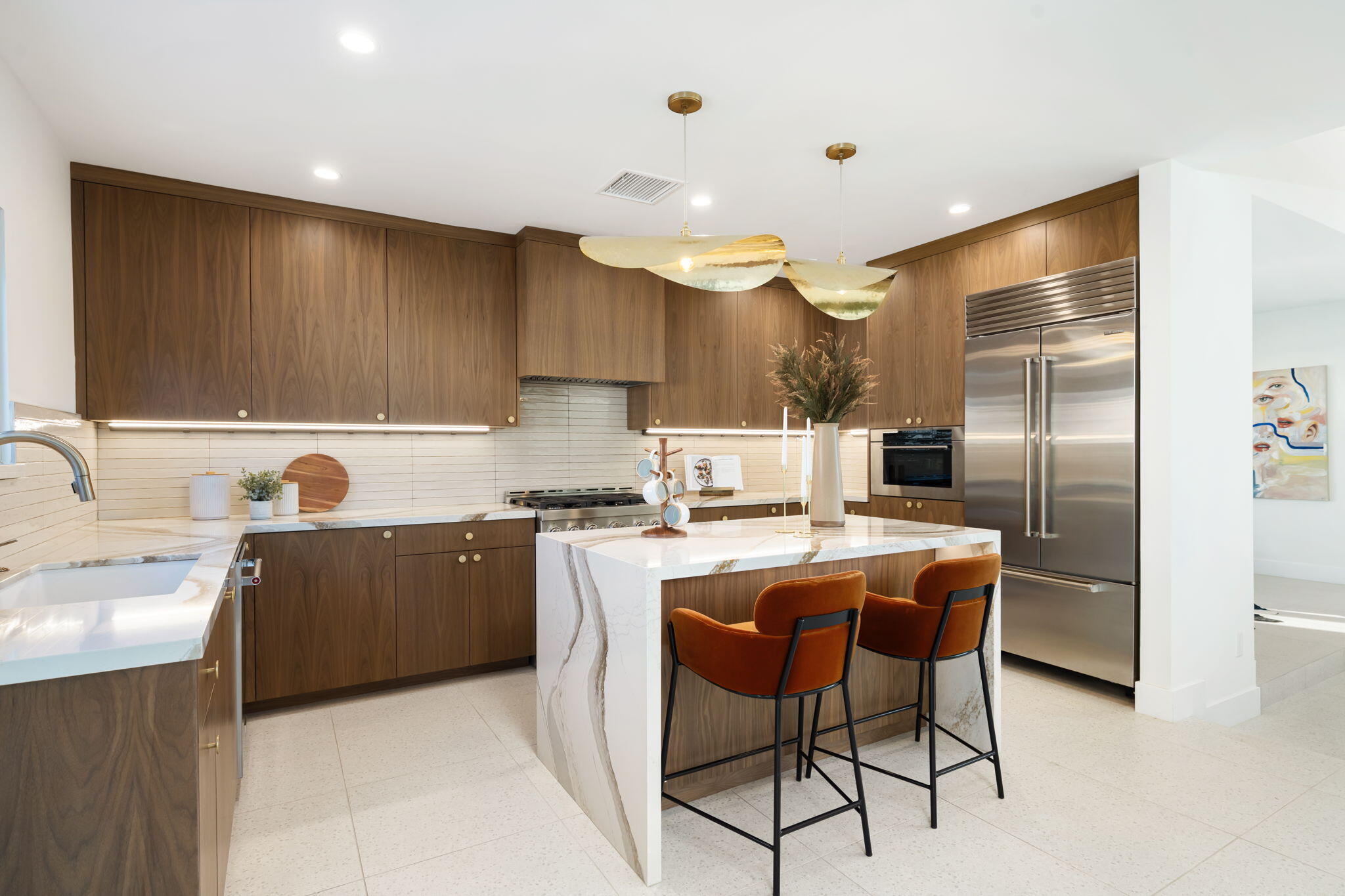 71459 Halgar Road Rancho Mirage, CA 92270 - Photo 26 of 46 a kitchen with stainless steel appliances granite countertop a sink a stove a refrigerator and island