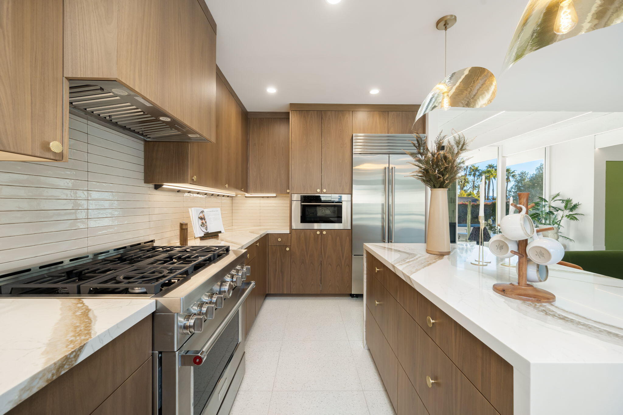 71459 Halgar Road Rancho Mirage, CA 92270 - Photo 29 of 46 a kitchen with a sink and cabinets