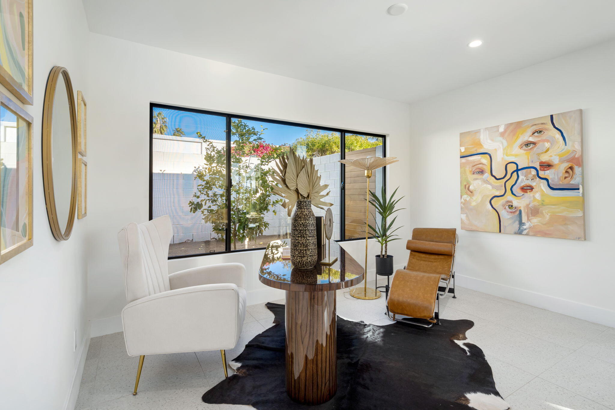 71459 Halgar Road Rancho Mirage, CA 92270 - Photo 32 of 46 a living room with furniture and a large window