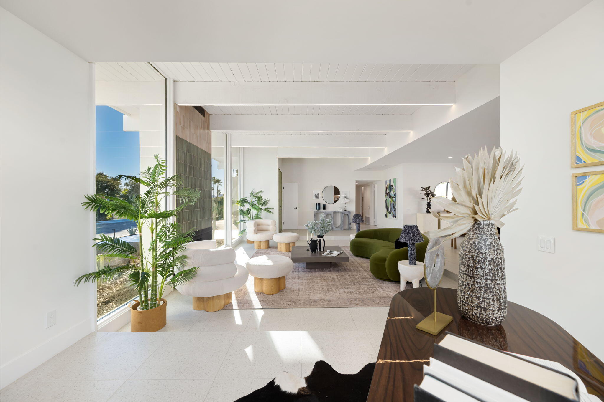 71459 Halgar Road Rancho Mirage, CA 92270 - Photo 33 of 46 a living room with fireplace furniture and potted plants