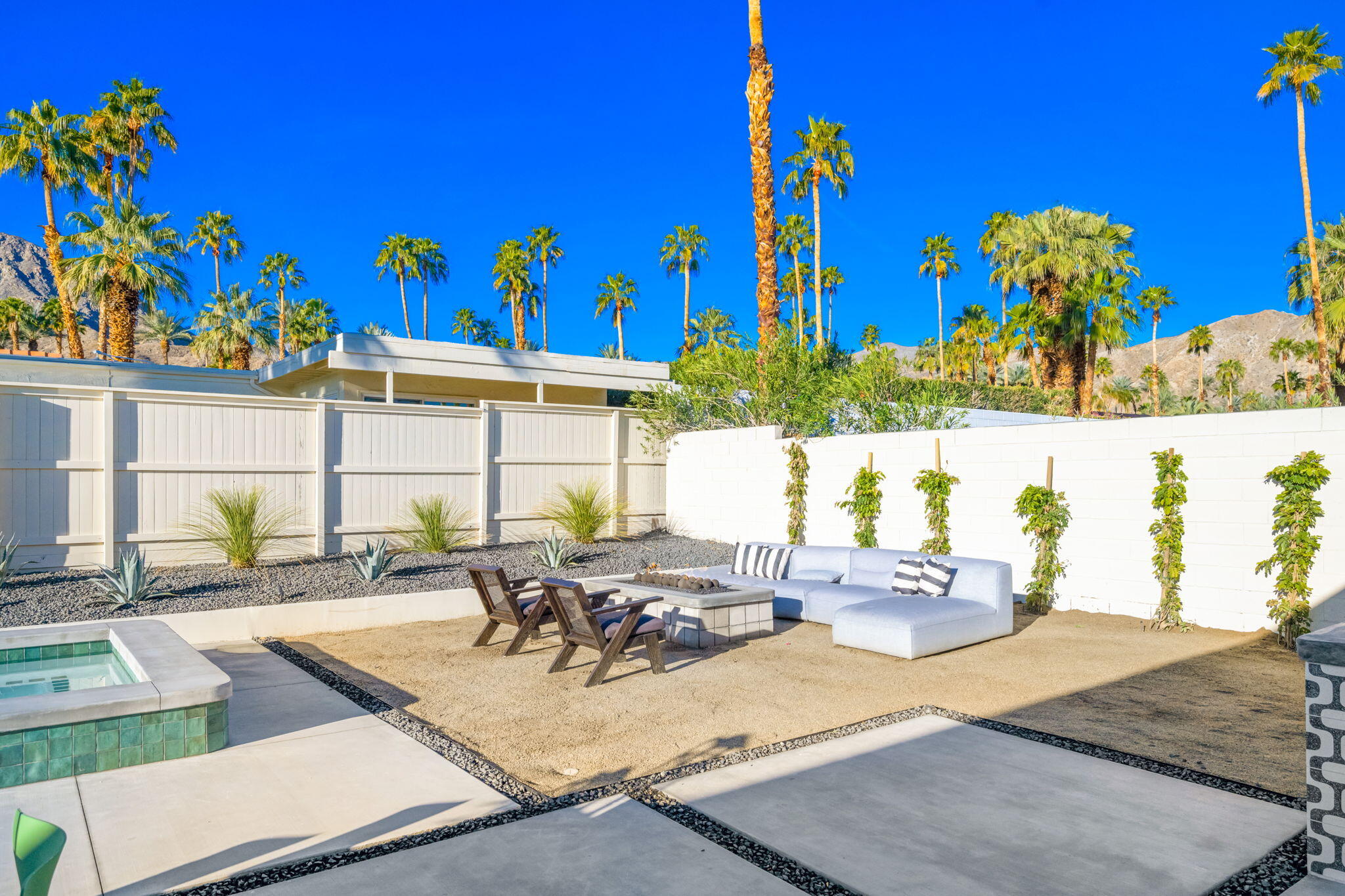 71459 Halgar Road Rancho Mirage, CA 92270 - Photo 35 of 46 a view of a swimming pool with a lounge chairs