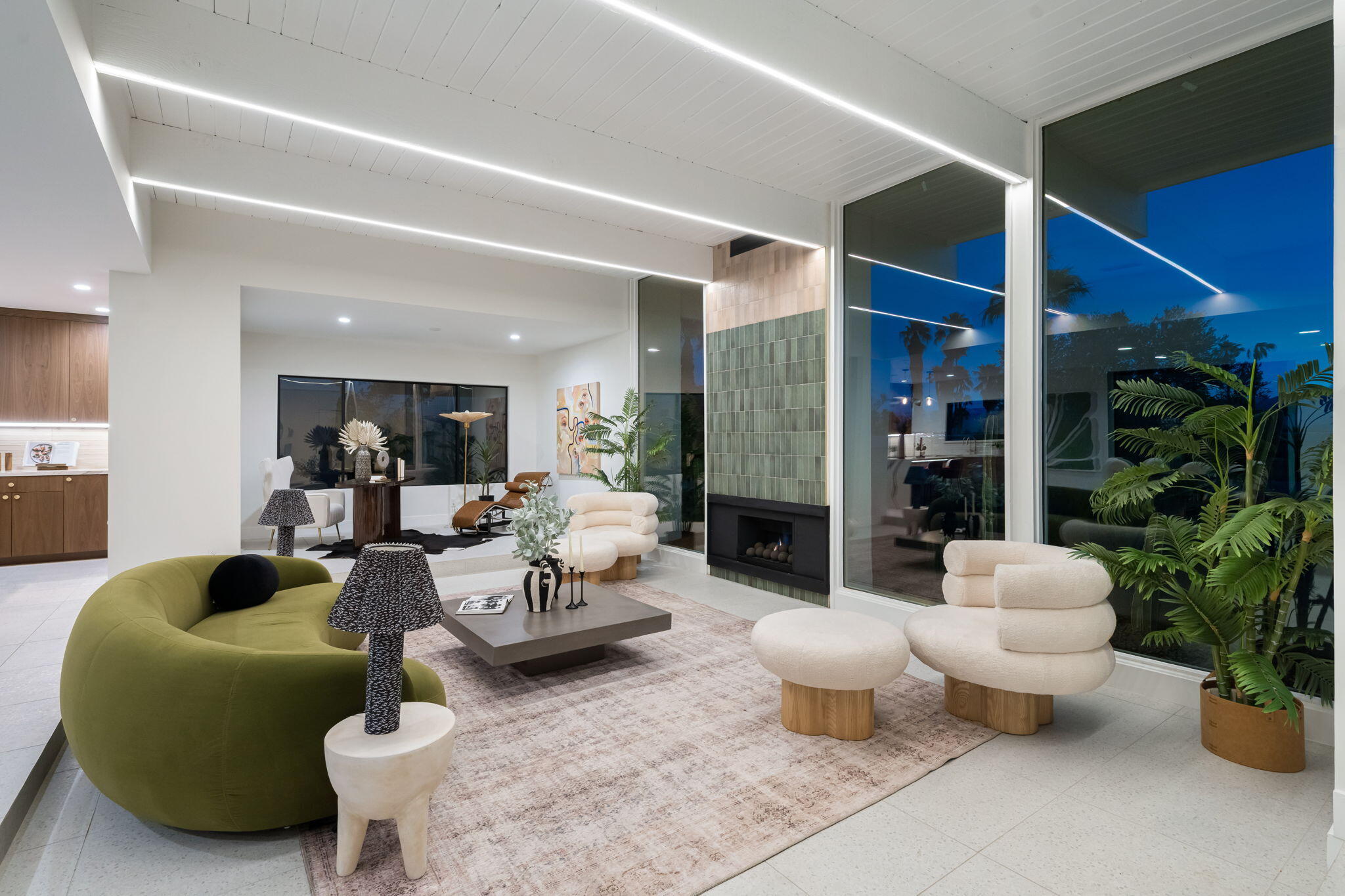 71459 Halgar Road Rancho Mirage, CA 92270 - Photo 5 of 46 a living room with furniture potted plant and glass windows