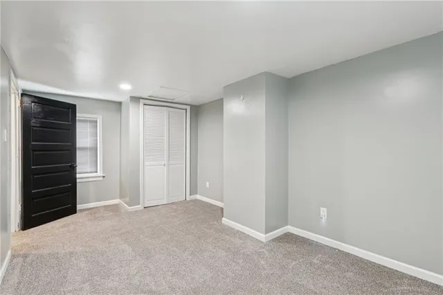 a view of a house with backyard