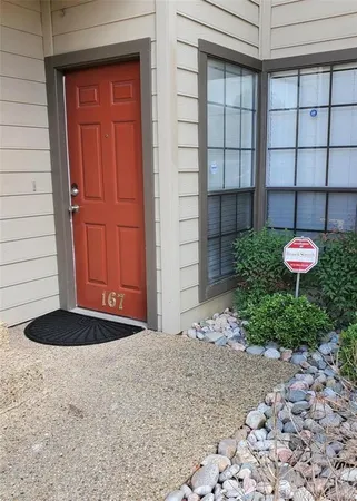 a view of a backyard of a house
