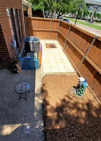 a view of a terrace with furniture