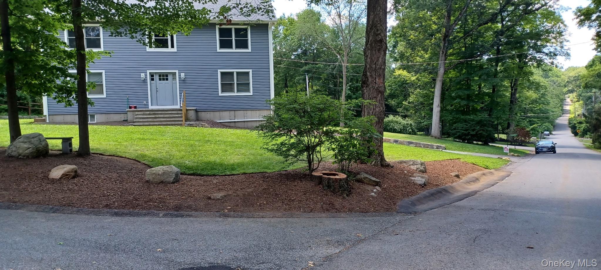 7 Tulip Road Mahopac, NY 10541 - Photo 2 of 32 a view of outdoor space yard and patio