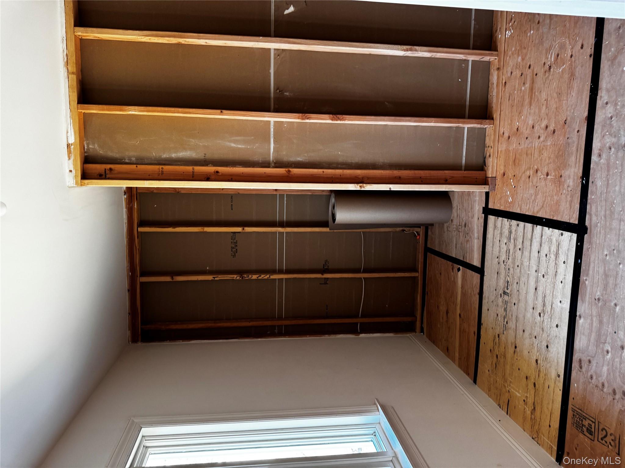 7 Tulip Road Mahopac, NY 10541 - Photo 29 of 32 a view of a refrigerator in kitchen and wooden floor