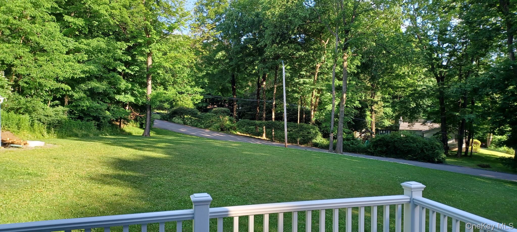 7 Tulip Road Mahopac, NY 10541 - Photo 31 of 32 a view of a wooden deck and garden