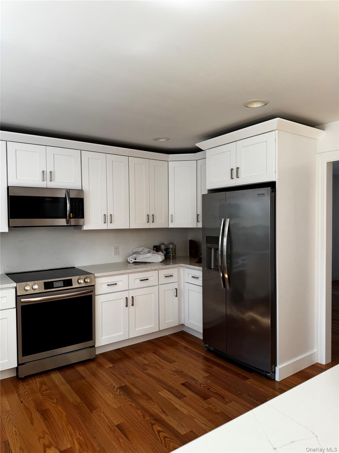 7 Tulip Road Mahopac, NY 10541 - Photo 5 of 32 a kitchen with stainless steel appliances granite countertop a stove a refrigerator and a sink