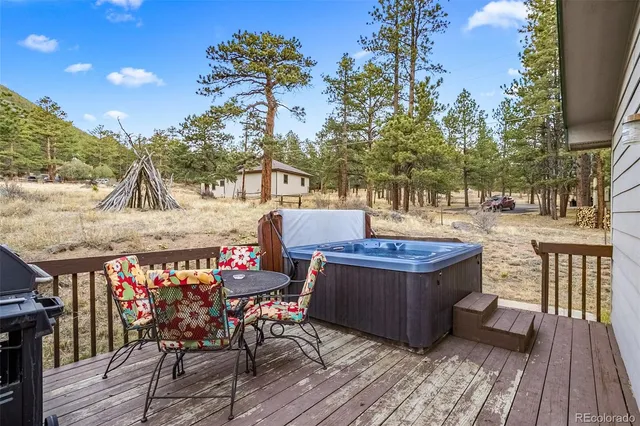 a view of outdoor sitting area with furniture