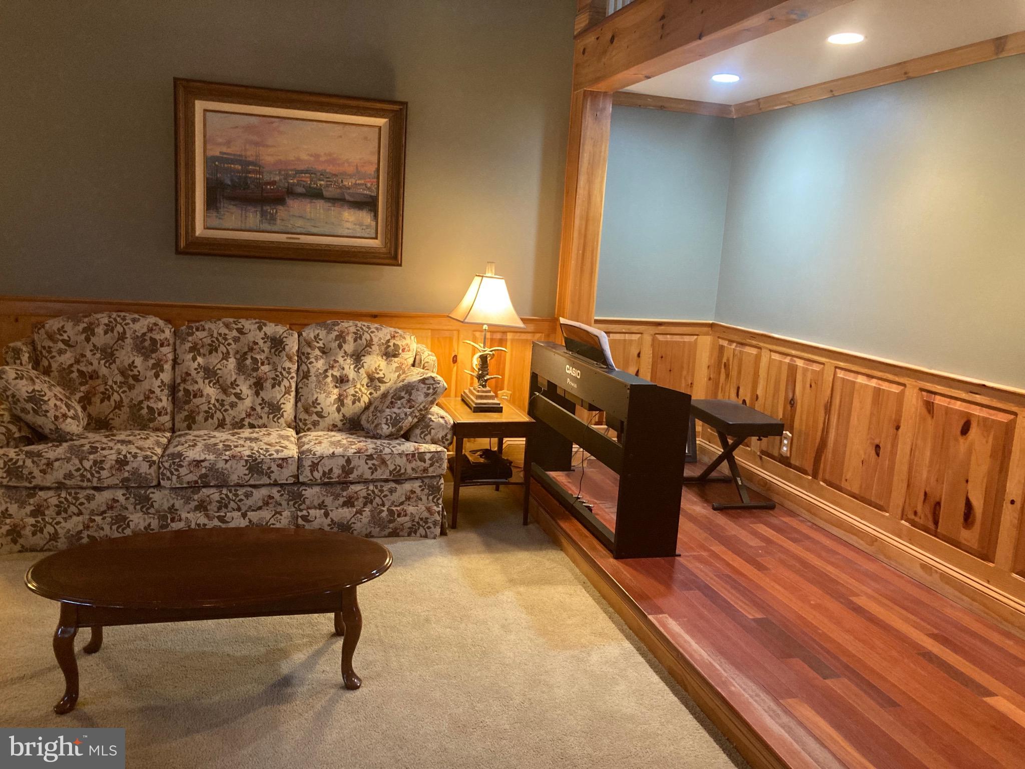 8124 Cromwell Church Road Hustontown, PA 17229 - Photo 18 of 61 a bed room with a bed and a couch