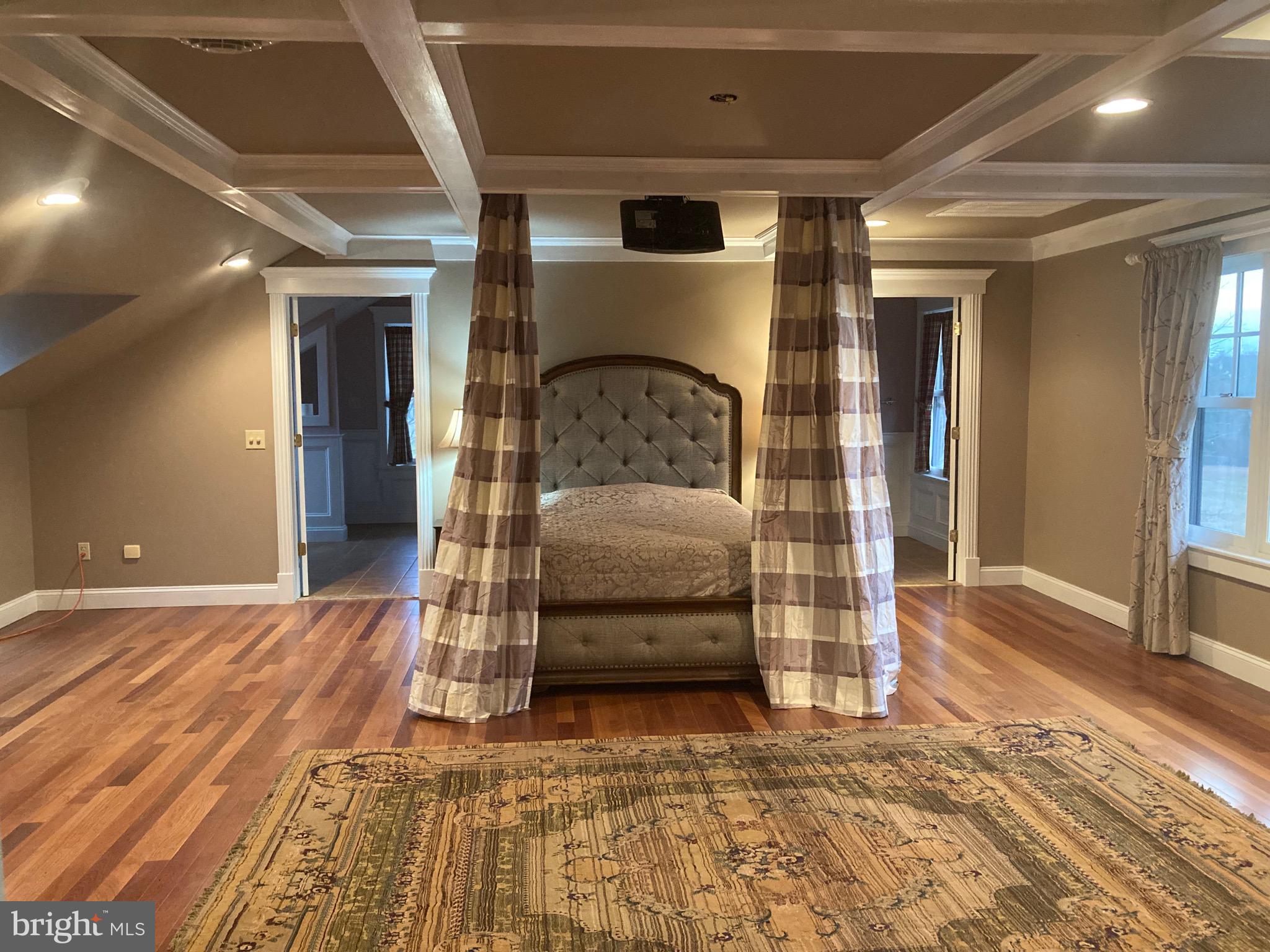 8124 Cromwell Church Road Hustontown, PA 17229 - Photo 23 of 61 a bedroom with a bed and a walk in closet
