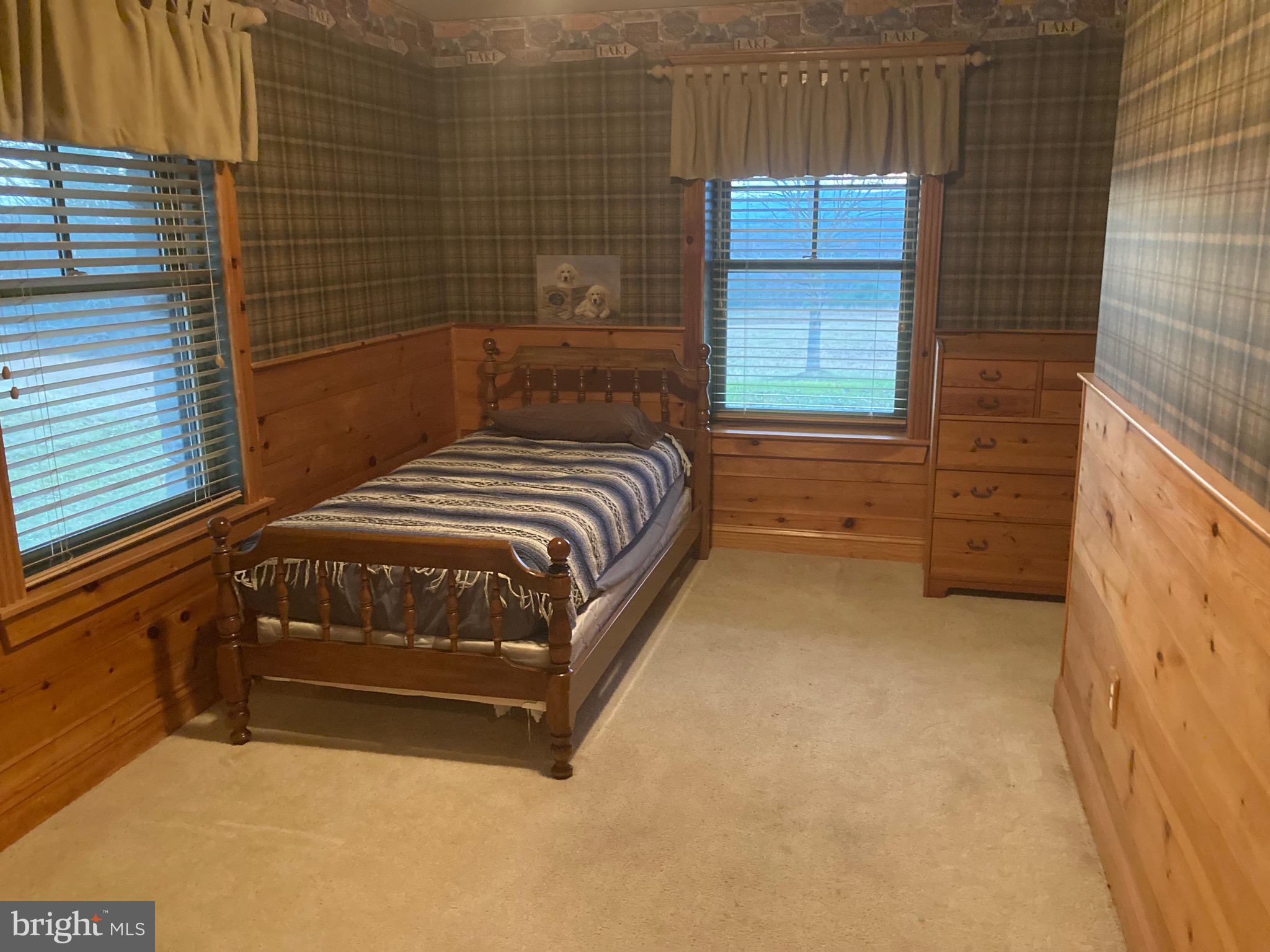 8124 Cromwell Church Road Hustontown, PA 17229 - Photo 28 of 61 a bedroom with a bed and a window