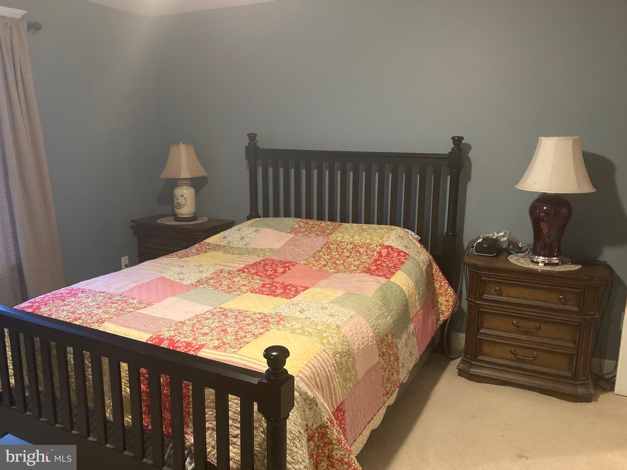 8124 Cromwell Church Road Hustontown, PA 17229 - Photo 29 of 61 a bedroom with a bed and a lamp