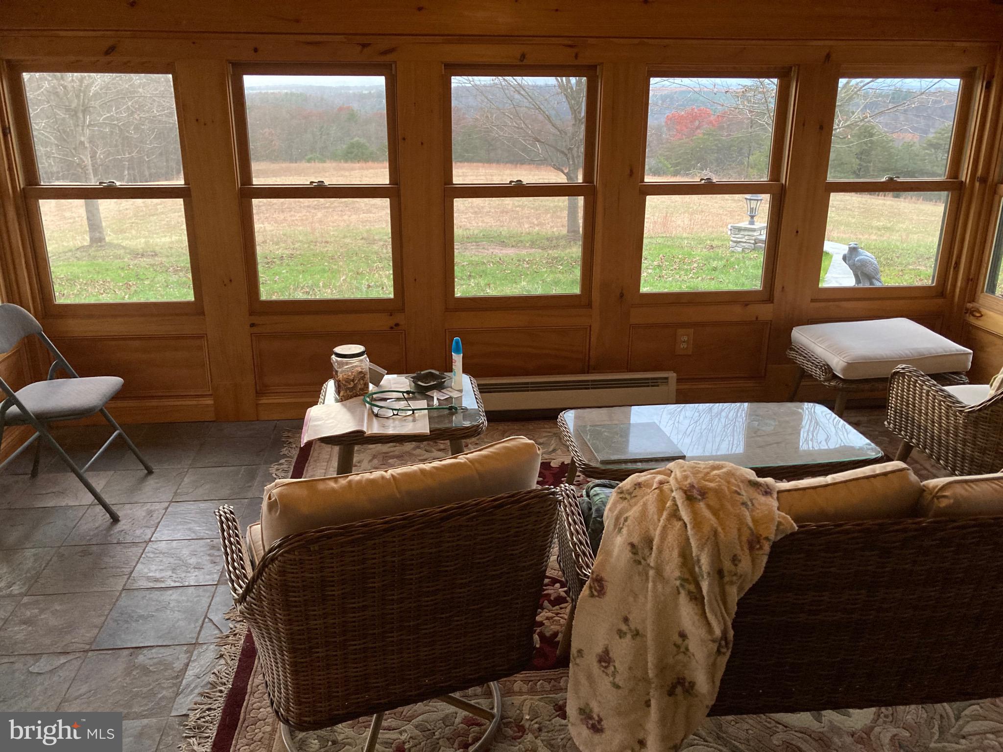 8124 Cromwell Church Road Hustontown, PA 17229 - Photo 34 of 61 a living room with furniture and two large window