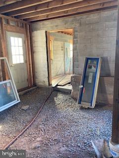 8124 Cromwell Church Road Hustontown, PA 17229 - Photo 38 of 61 a view of a livingroom with wooden floor and a fireplace