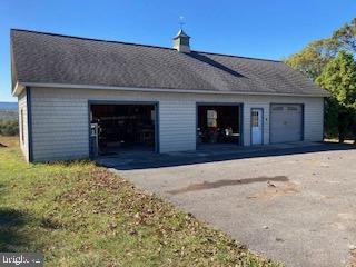 8124 Cromwell Church Road Hustontown, PA 17229 - Photo 44 of 61 a front view of a house