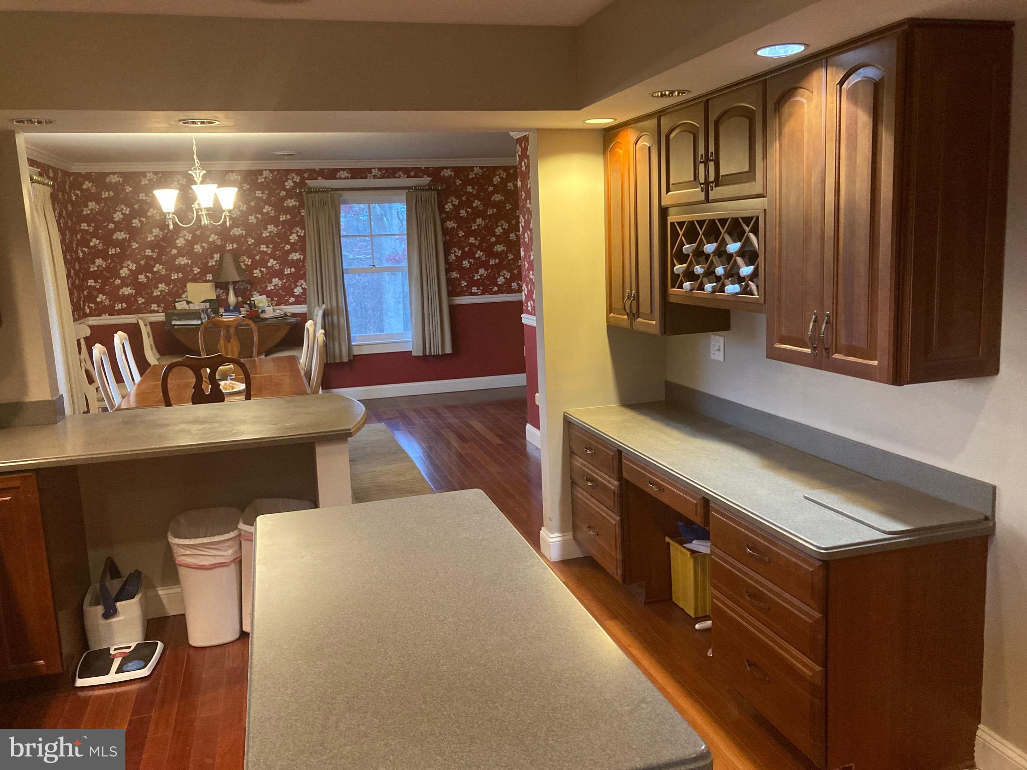 8124 Cromwell Church Road Hustontown, PA 17229 - Photo 7 of 61 a kitchen with stainless steel appliances wooden cabinets and a stove top oven