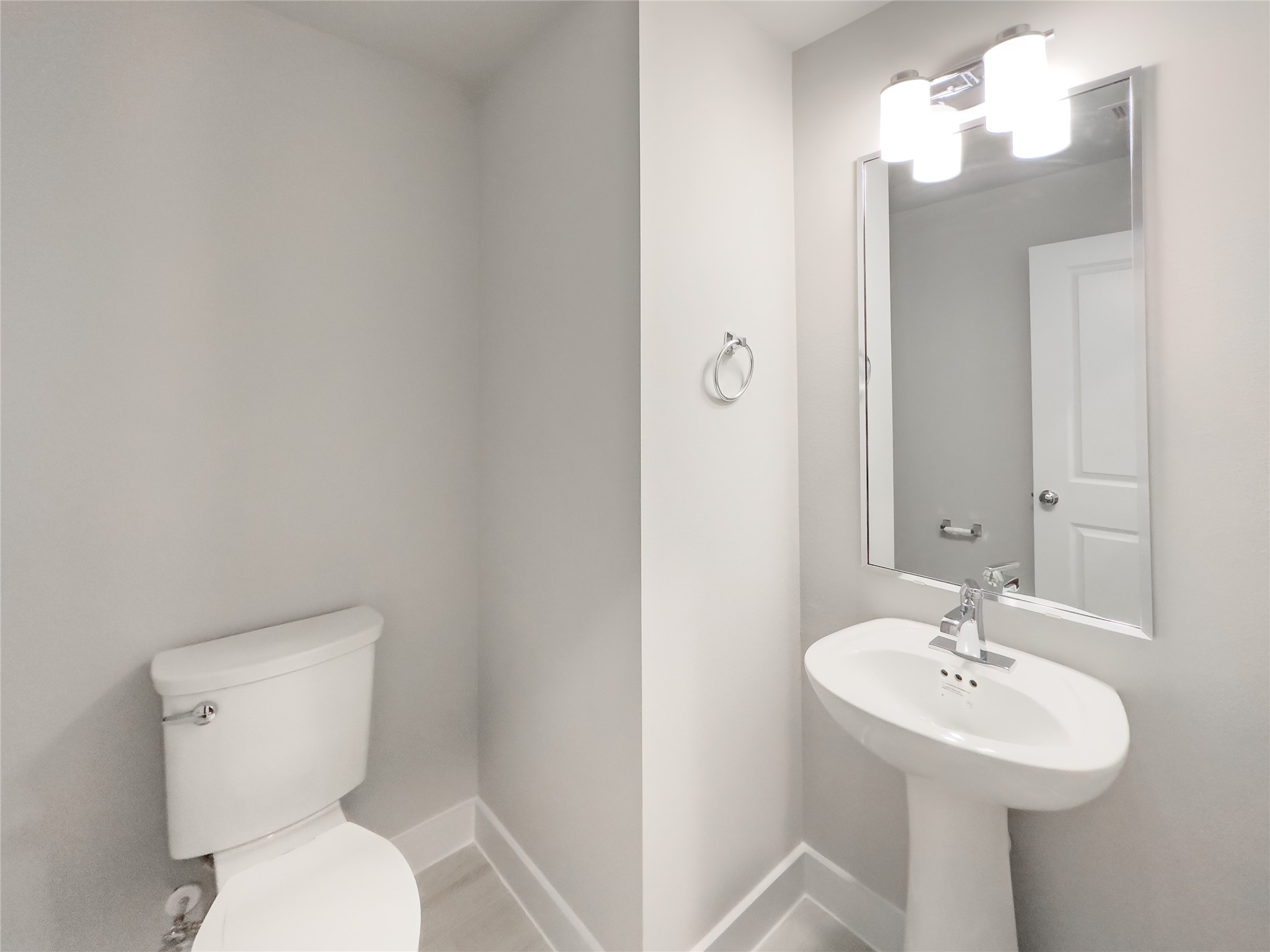 1250 North Post Oak Road, Unit C Houston, TX 77055 - Photo 12 of 31 Conveniently located on the second floor, this stylish guest bathroom offers comfort and modern design.