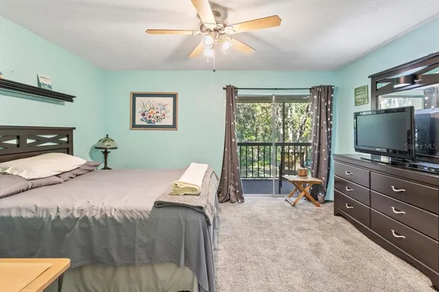 a bedroom with a bed and furniture