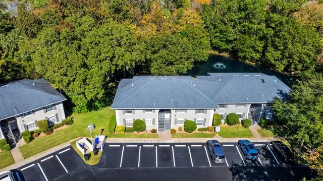 a aerial view of a house with a garden and plants