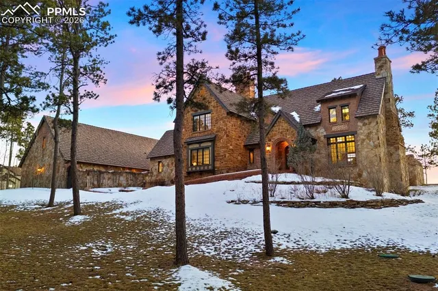 a street sign on a sidewalk next to a road