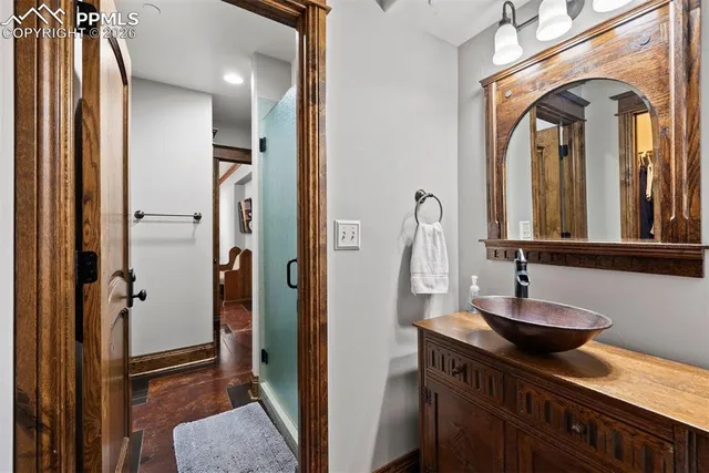 a view of a livingroom with furniture and a large window