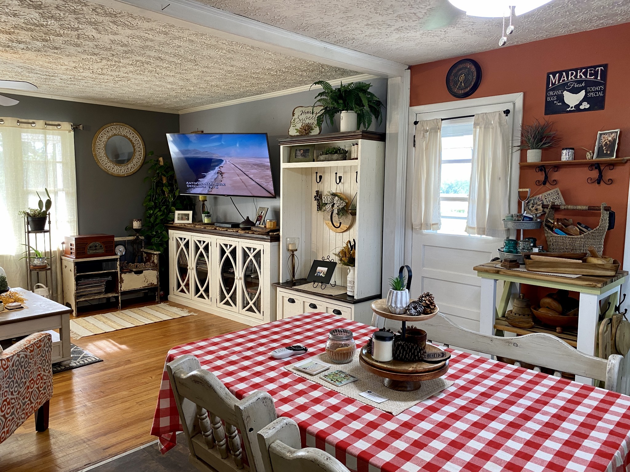 3216 Oak Grove Road Decherd, TN 37324 - Photo 7 of 27 a living room with furniture a flat screen tv and a fireplace