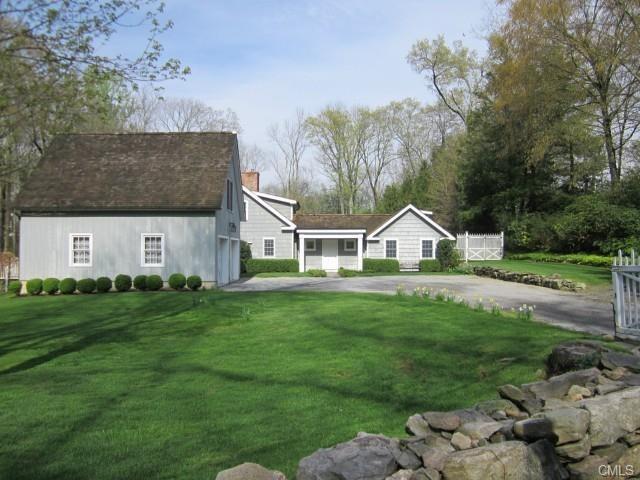 925 Rock Rimmon Road Stamford, CT 06903 - Photo 1 of 1 a front view of a house with garden