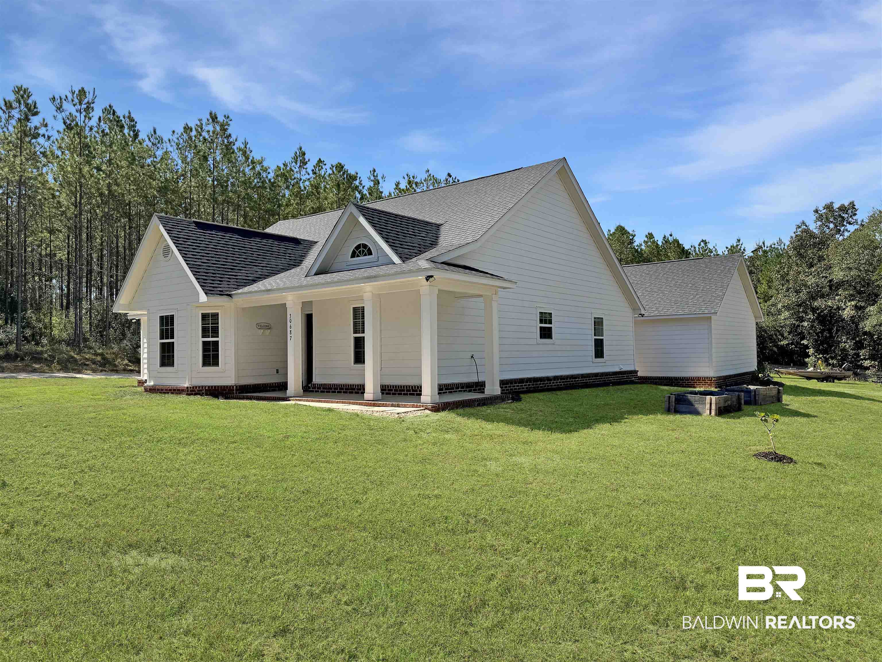 30687 Brady Road Robertsdale, AL 36567 - Photo 4 of 53 View of house from the north east corner.