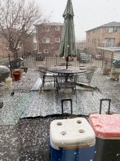 a table and chairs sitting in the patio