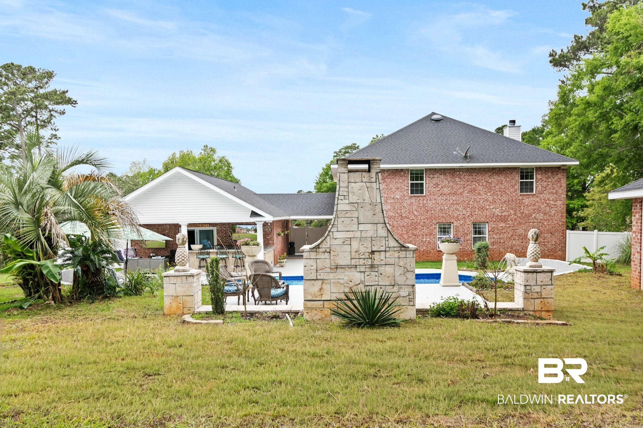 2 Speckle Trout Route Daphne, AL 36527 - Photo 34 of 61 Rear view of property featuring a patio area, a fenced backyard, a chimney, and brick siding