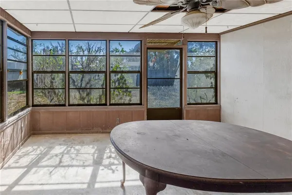 a view of an empty room and window