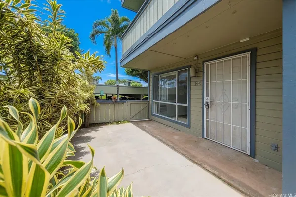 a view of a door and a window