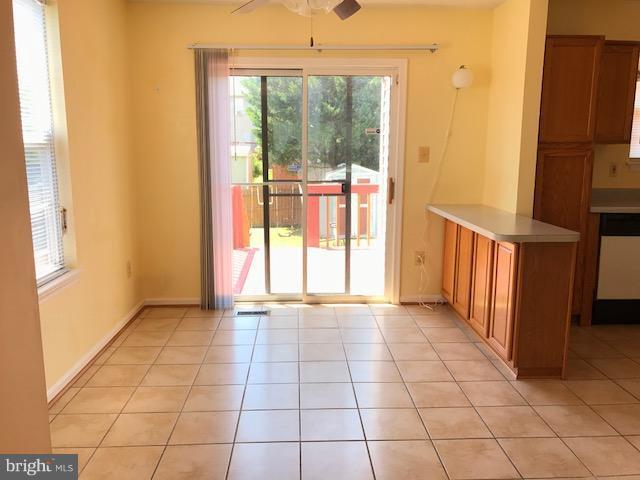 2100 Riding Crop Way Baltimore, MD 21244 - Photo 5 of 10 a view of an empty room with a window