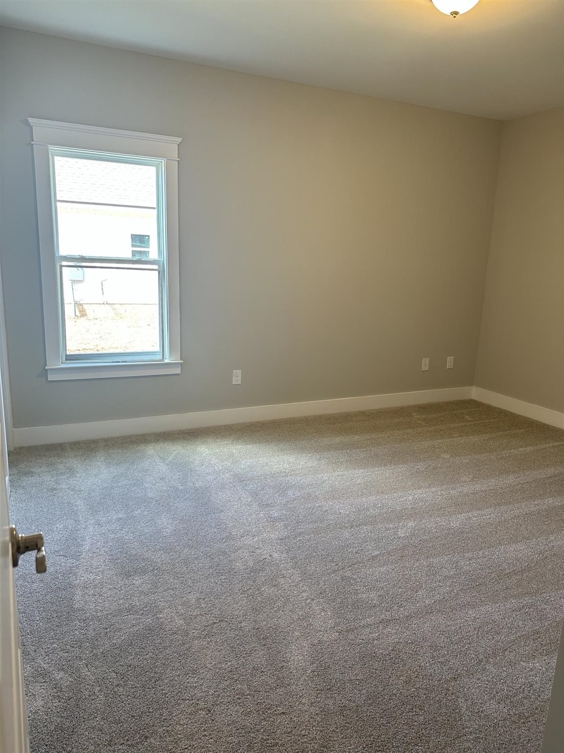 6264 Howie Way Pace, FL 32571 - Photo 19 of 34 an empty room with a window