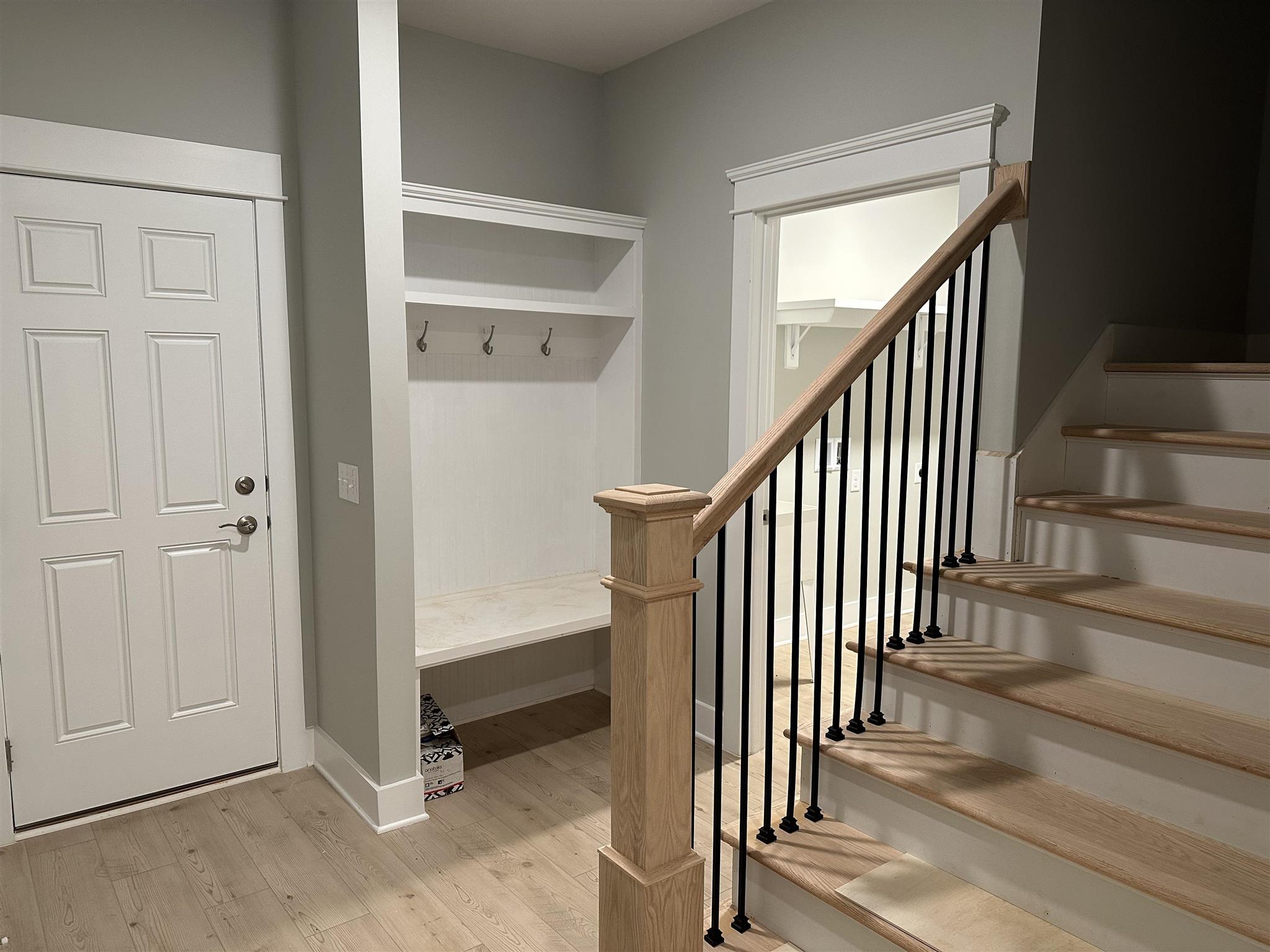 6264 Howie Way Pace, FL 32571 - Photo 24 of 34 a view of a hallway with staircase