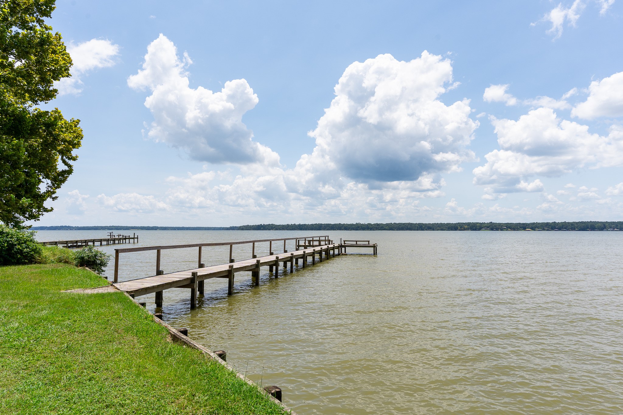 Tba Buzzard Roost Trail Trinity, TX 75862 - Photo 19 of 21 a view of a lake with couches in front of house