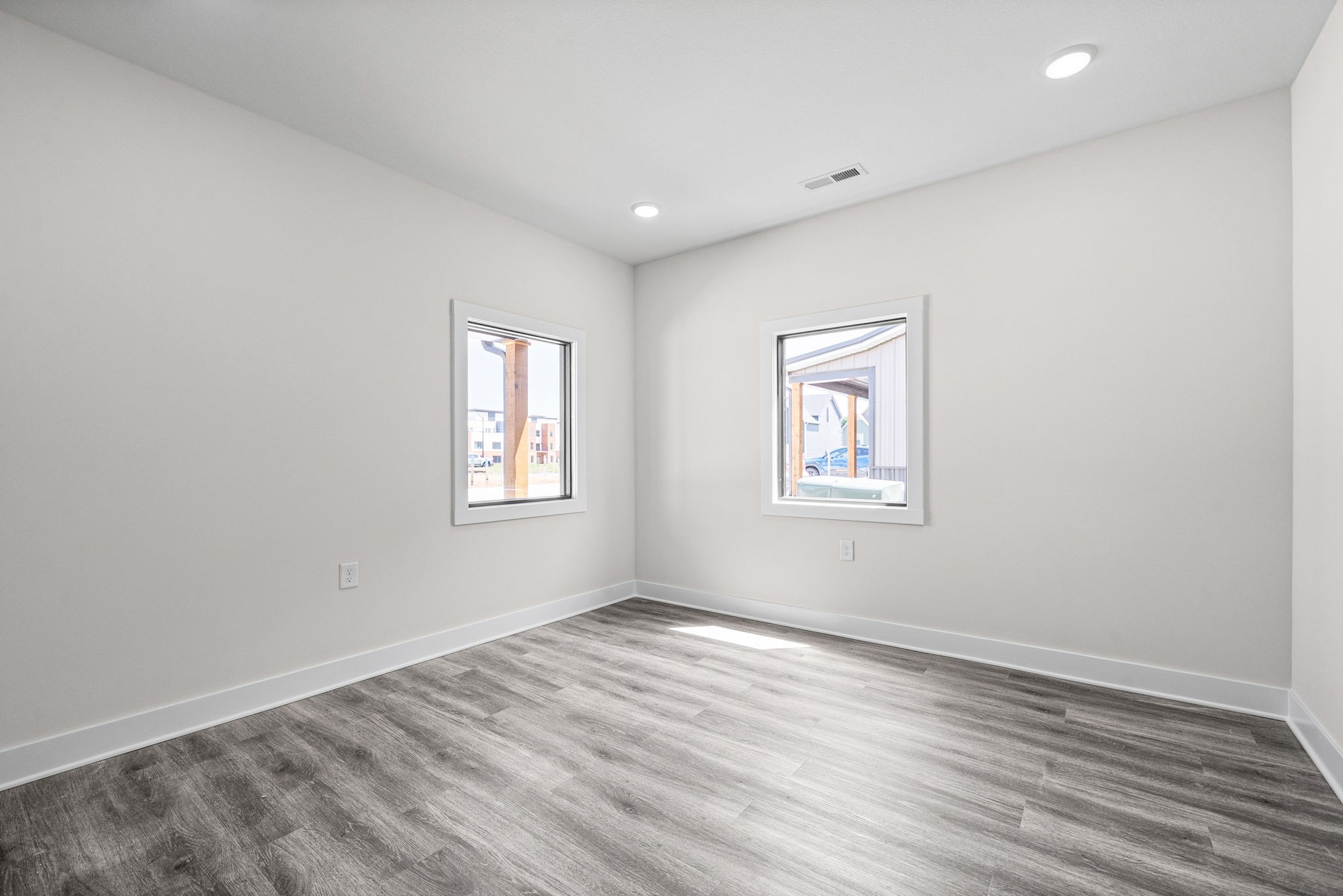 2510 Pea Ridge Road Clarksville, TN 37040 - Photo 12 of 41 a view of empty room with wooden floor and fan