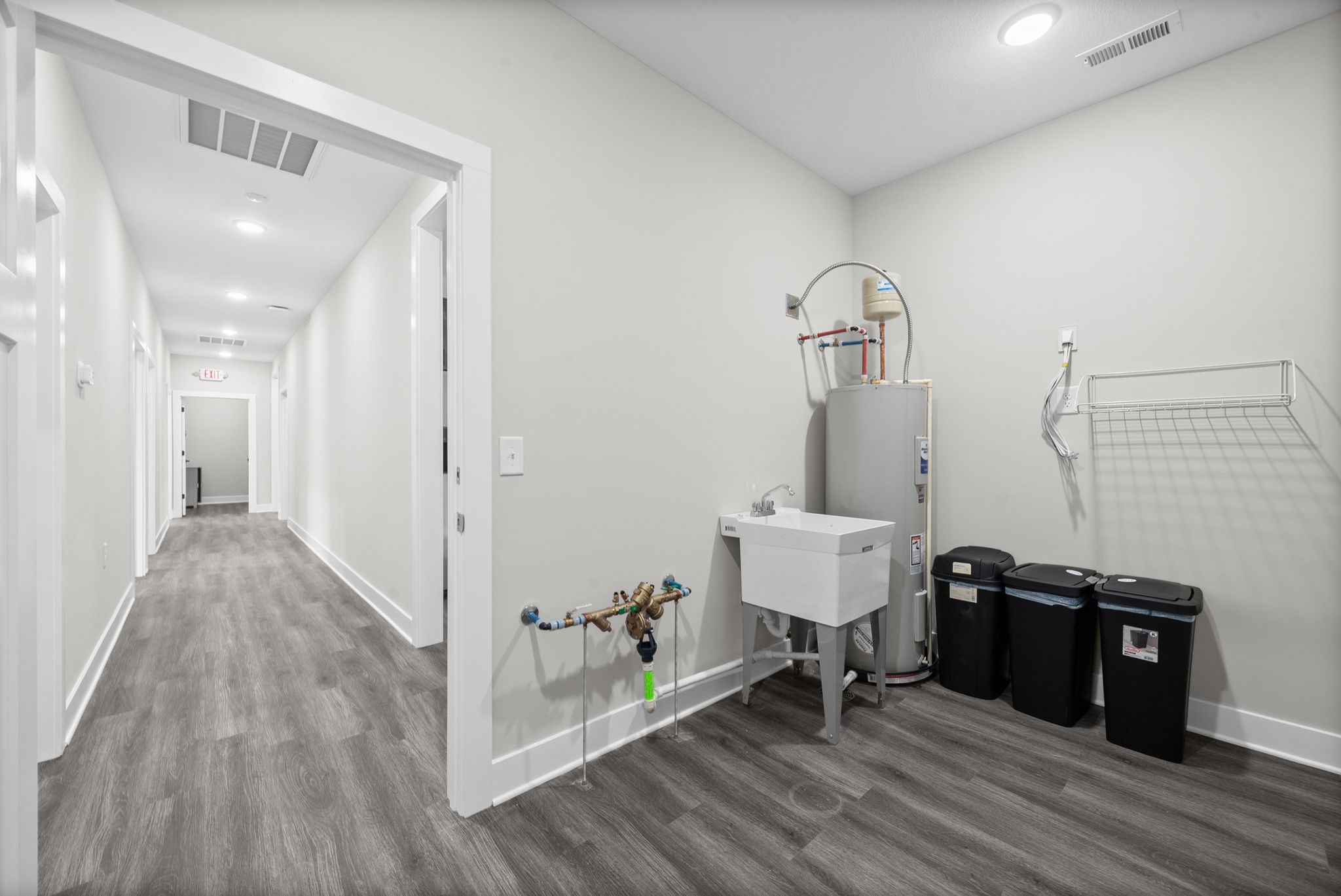 2510 Pea Ridge Road Clarksville, TN 37040 - Photo 30 of 41 a view of a hallway with wooden floor and staircase