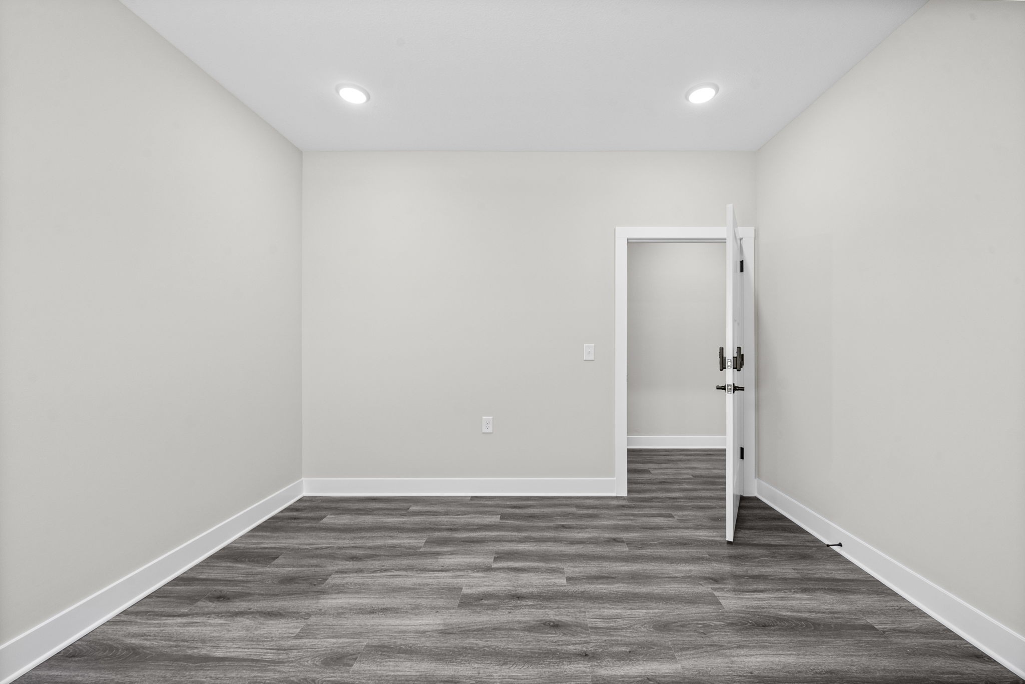 2510 Pea Ridge Road Clarksville, TN 37040 - Photo 36 of 41 a view of an empty room with wooden floor