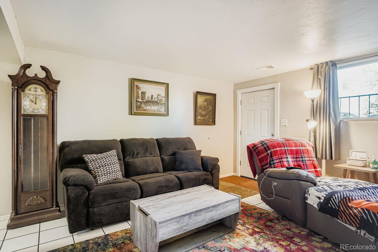 7111 Raleigh Street Westminster, CO 80030 - Photo 11 of 38 a living room with furniture