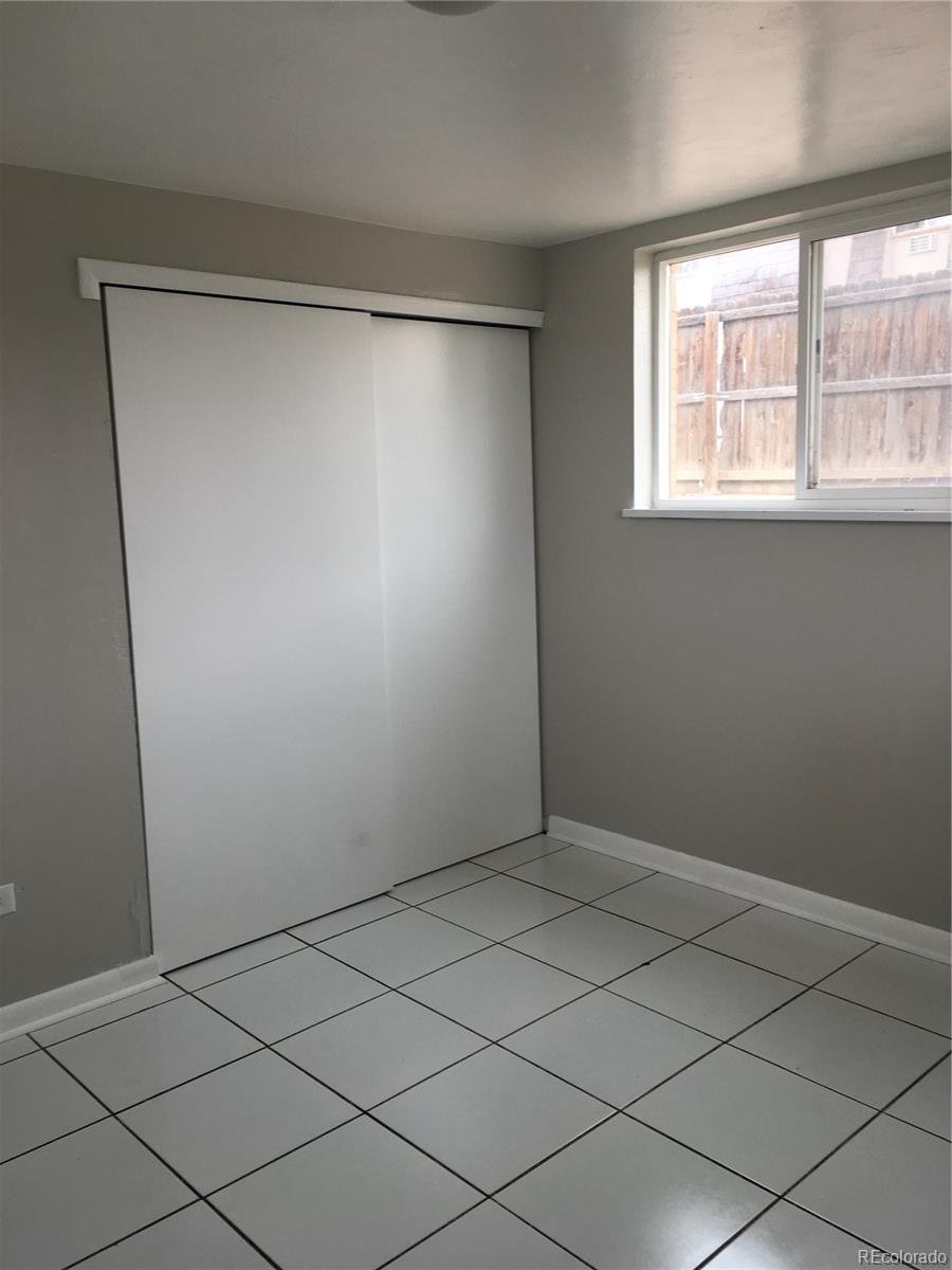 7111 Raleigh Street Westminster, CO 80030 - Photo 31 of 38 a view of a small space with a window