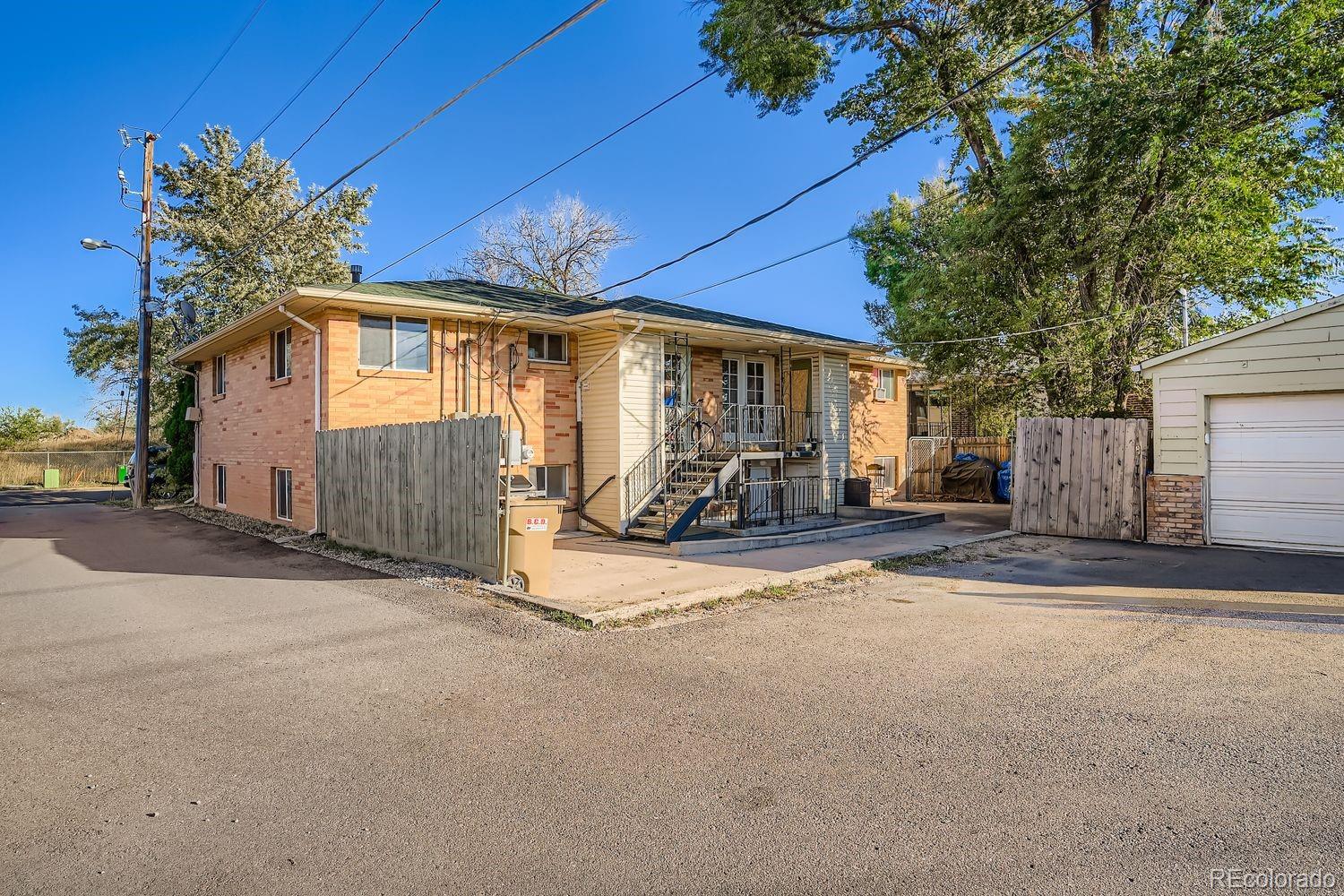 7111 Raleigh Street Westminster, CO 80030 - Photo 6 of 38 a view of a house with a patio