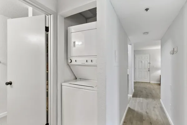 a view of bathroom with a washer and dryer