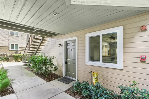 a view of house with backyard
