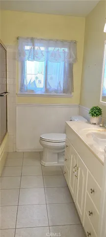 a view of a hallway with windows