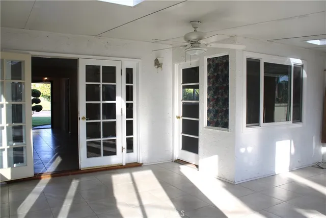 a backyard of a house with a garden and plants