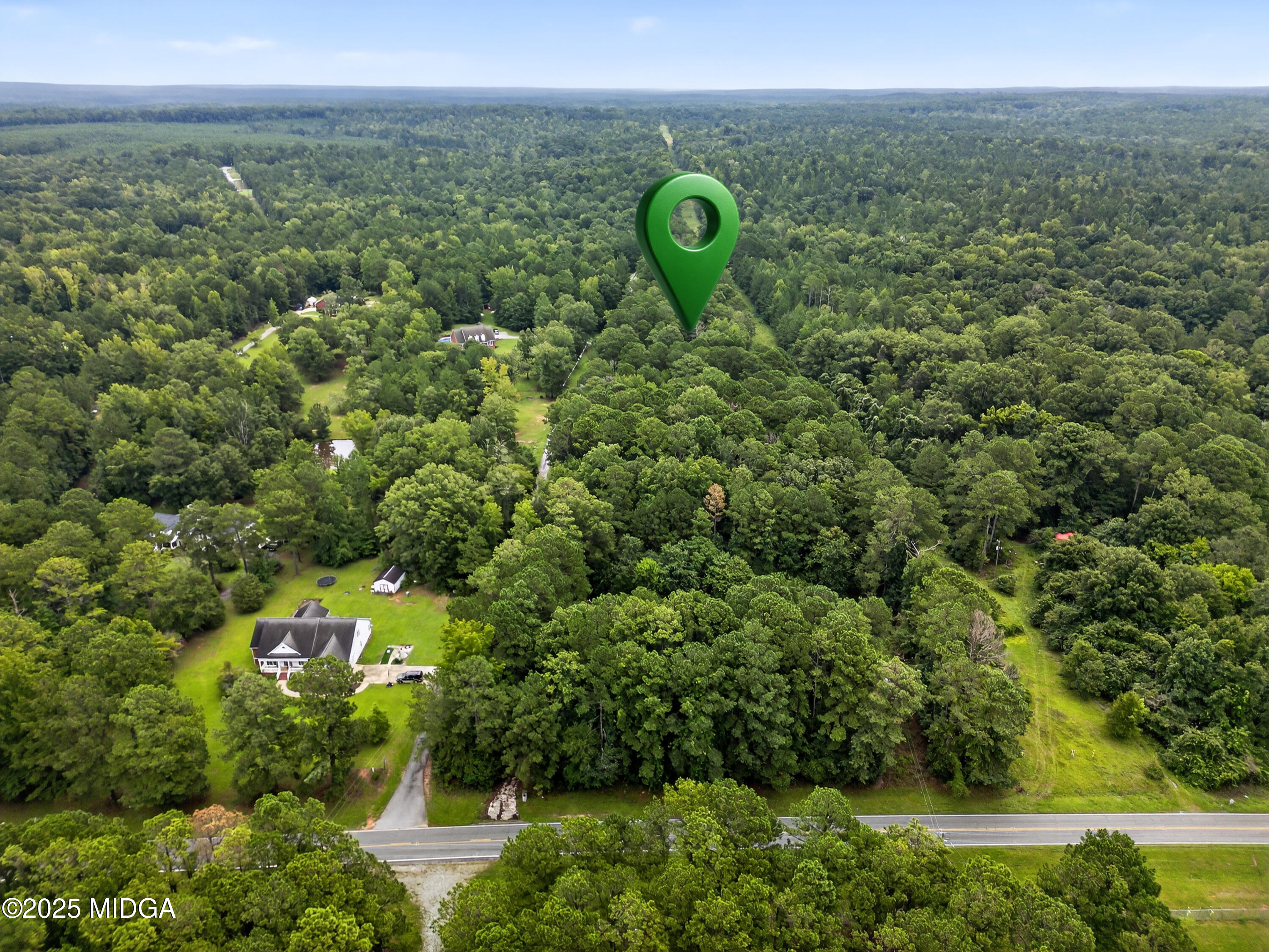 615 Lite-N-Tie Road Gray, GA 31032 - Photo 11 of 19 a view of a trees in a field