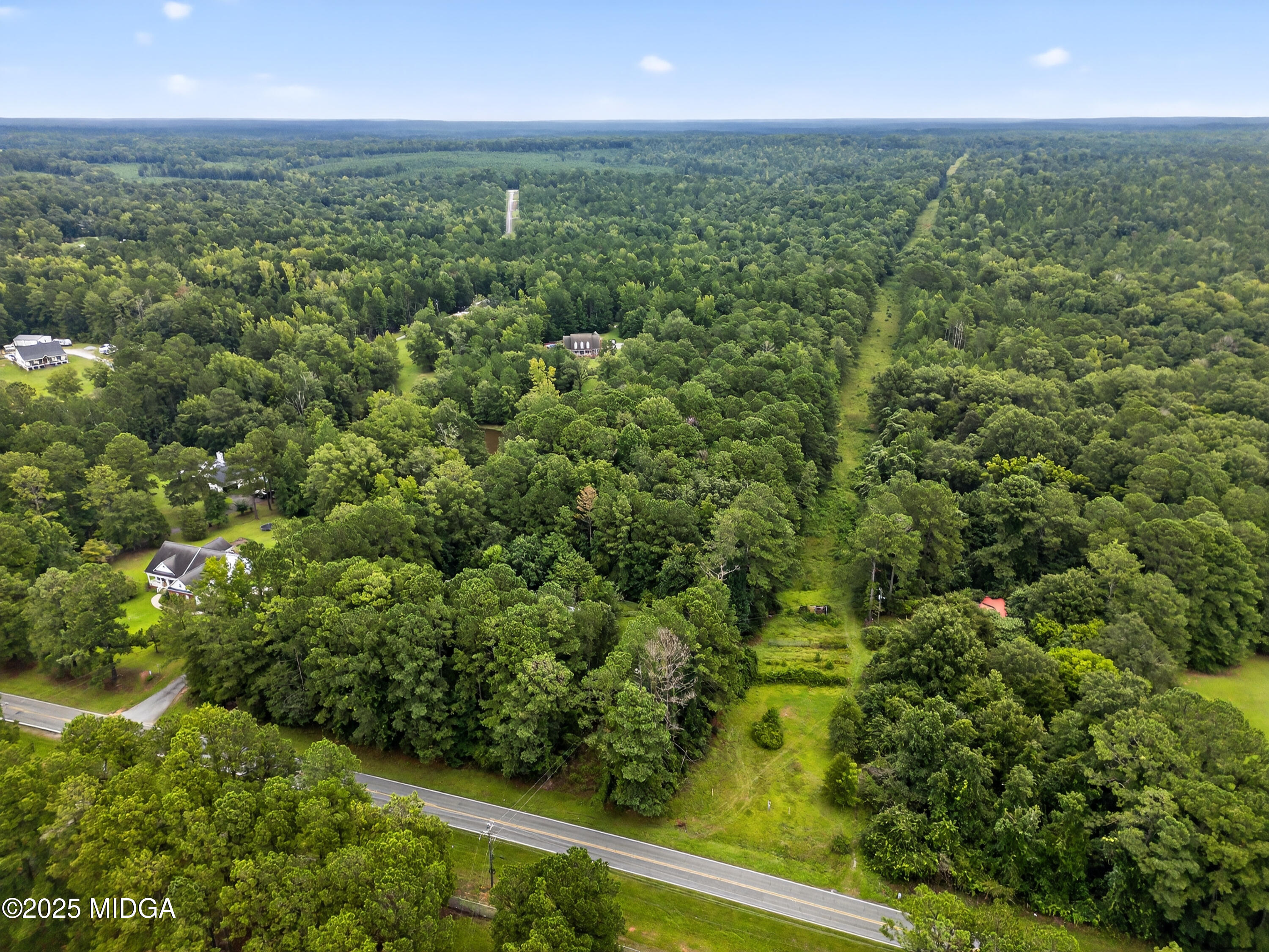 615 Lite-N-Tie Road Gray, GA 31032 - Photo 17 of 19 an aerial view of residential houses with outdoor space and trees